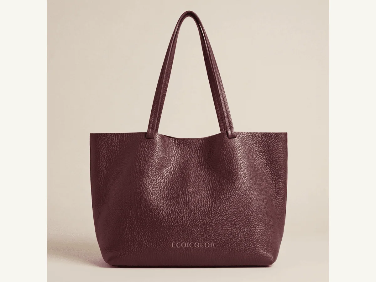 Vegan leather tote sample with metal trim and logo option for premium buyer review