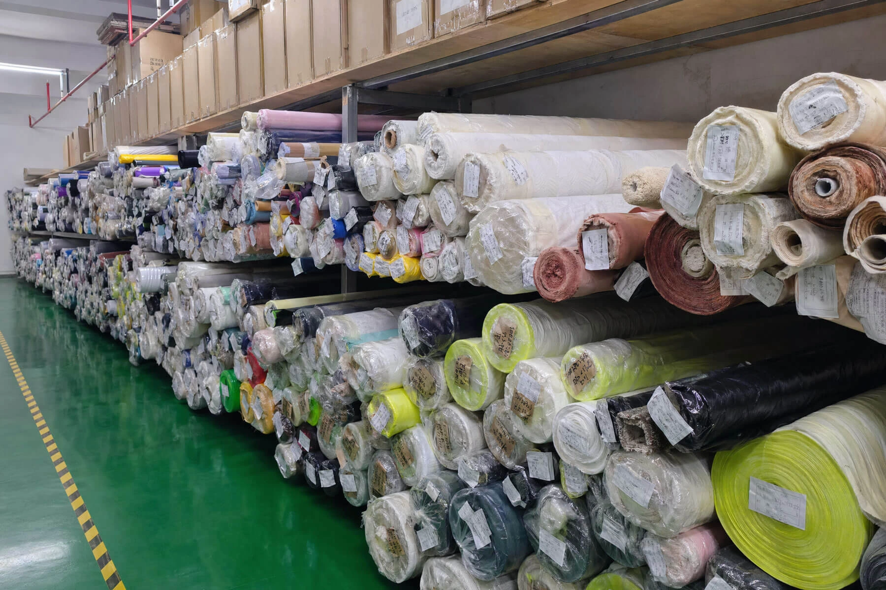50+ sustainable materials inventory including rPET, organic cotton, and canvas