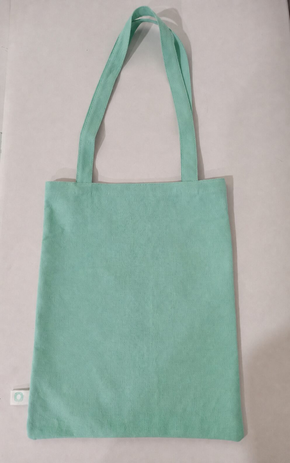 De-identified recycled-cotton conference tote sample