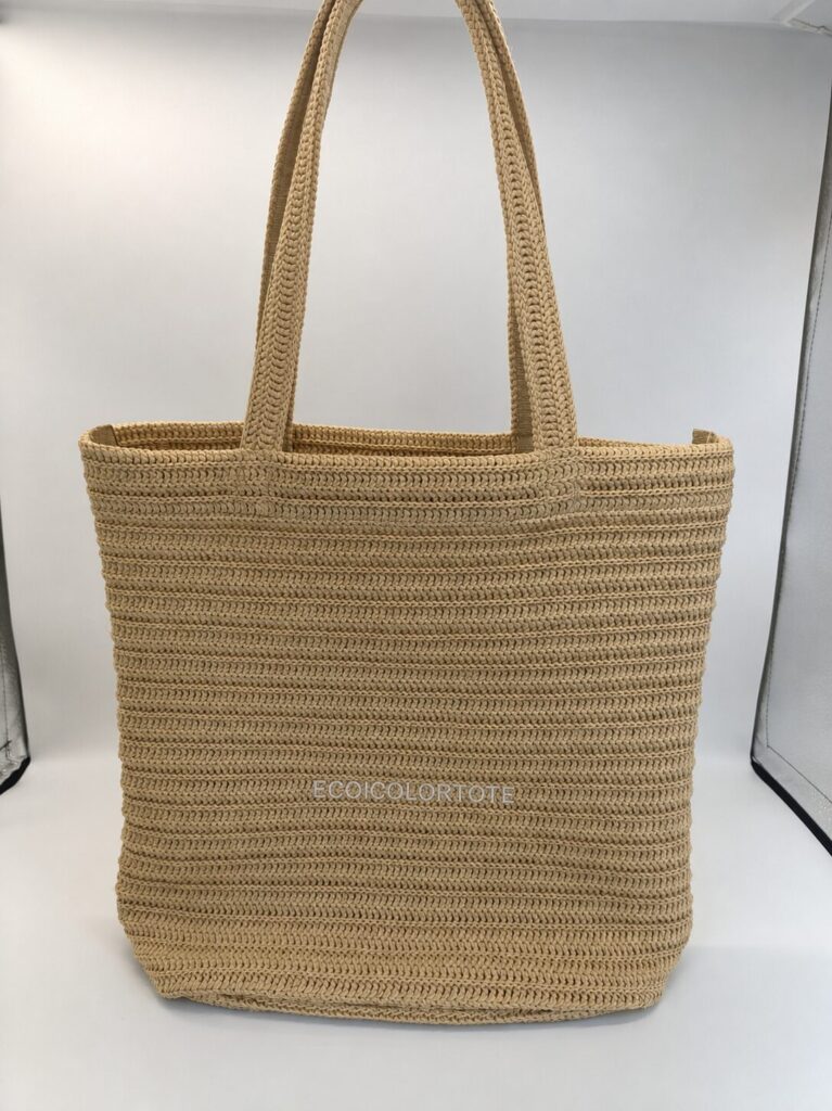Khaki PP woven straw private label tote sample with anonymized embroidery