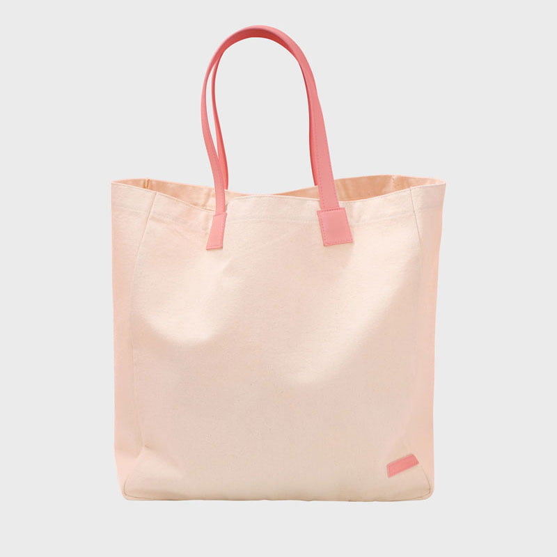 Recycled-cotton blend tote with handles and patch label used for dimension-equivalent box capacity testing